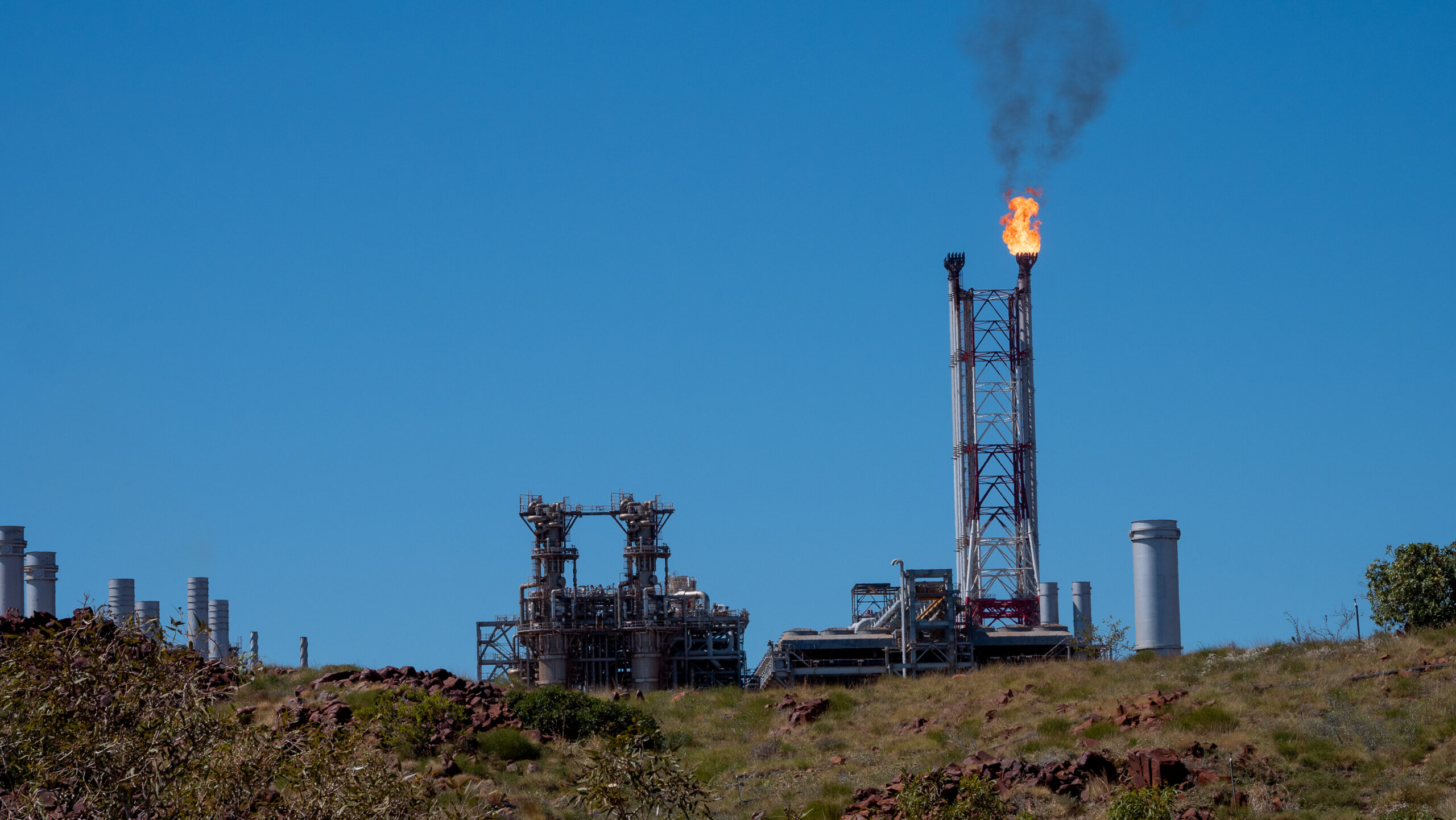 Gas flaring at Woodside’s Pluto LNG processing facility. Image courtesy of the Conservation Council of Western Australia (CCWA). Gas flaring at Woodside’s Pluto LNG processing facility. Image courtesy of the Conservation Council of Western Australia (CCWA).